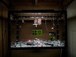 Buzz Article: Gallery Spotlight: Hand Trap Geocache Sticker
